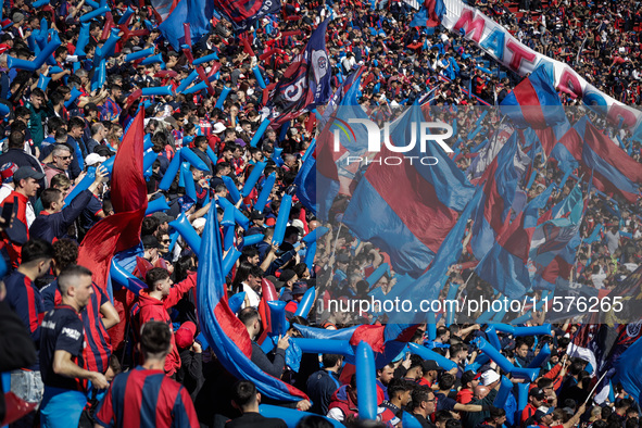 Fans of San Lorenzo cheer for their team before a match between San Lorenzo and Velez as part of Copa de la Liga 2024 at Estadio Pedro Bideg...