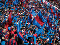 Fans of San Lorenzo cheer for their team before a match between San Lorenzo and Velez as part of Copa de la Liga 2024 at Estadio Pedro Bideg...