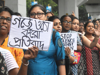 Women march along a street during a protest condemning the rape and murder of a trainee medic at a government-run hospital in Kolkata, India...