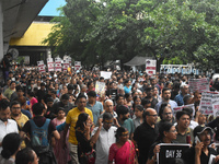 Citizens march along a street during a protest condemning the rape and murder of a trainee medic at a government-run hospital in Kolkata, In...