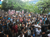 Citizens march along a street during a protest condemning the rape and murder of a trainee medic at a government-run hospital in Kolkata, In...