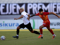 In Ta' Qali, Malta, on September 14, 2024, Kleiton do Monte Lima Basilio of Hibernians is closely followed by Leandro Lautaro Lacunza of Bir...