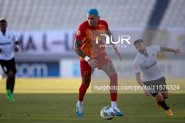 Alessandro Coppola of Birkirkara is in action during the Malta 360 Sports Premier League soccer match between Hibernians and Birkirkara at t...