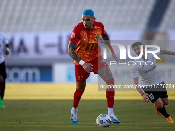 Alessandro Coppola of Birkirkara is in action during the Malta 360 Sports Premier League soccer match between Hibernians and Birkirkara at t...