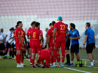 Birkirkara soccer players refresh themselves during a cooling break at the Malta 360 Sports Premier League soccer match between Hibernians a...