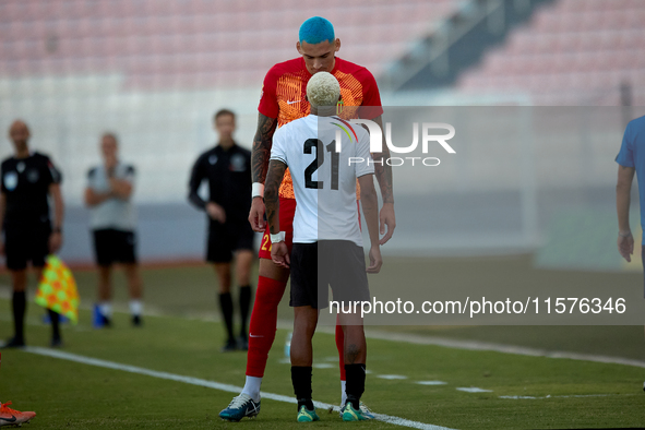 Alessandro Coppola of Birkirkara speaks with Alex Bruno de Souza Silva of Hibernians during the Malta 360 Sports Premier League soccer match...