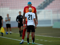 Alessandro Coppola of Birkirkara speaks with Alex Bruno de Souza Silva of Hibernians during the Malta 360 Sports Premier League soccer match...