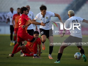 Federico Falcone (C) of Hibernians is in action during the Malta 360 Sports Premier League soccer match between Hibernians and Birkirkara at...