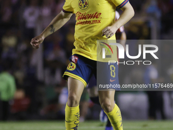 Alvaro Fidalgo #8 of America controls the ball during the 17th round match of the Torneo de Apertura as part of the Liga MX between Chivas d...