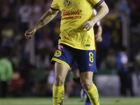 Alvaro Fidalgo #8 of America controls the ball during the 17th round match of the Torneo de Apertura as part of the Liga MX between Chivas d...