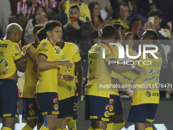 Team America celebrates after scoring a goal during the 17th round match of the Torneo de Apertura as part of the Liga MX between Chivas de...