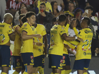 Team America celebrates after scoring a goal during the 17th round match of the Torneo de Apertura as part of the Liga MX between Chivas de...