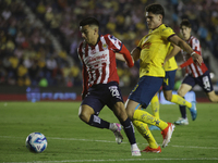 Fernando Beltran Cruz #20 of Chivas de Guadalajara drives the ball forward during the 17th round match of the Torneo de Apertura as part of...