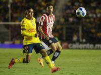 Erick Sanchez #28 of America drives the ball forward during the 17th round match of the Torneo de Apertura as part of the Liga MX between Ch...