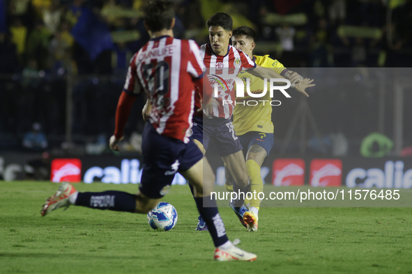 Jose Castillo Perez #21 of Chivas de Guadalajara drives the ball forward during the 17th round match of the Torneo de Apertura as part of th...