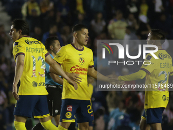 Team America celebrates a goal during the 17th round match of the Torneo de Apertura as part of the Liga MX between Chivas de Guadalajara an...