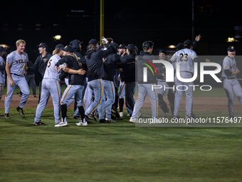 The Yolo High Wheelers celebrate advancing to the Pioneer Baseball League's championship series with their 6 to 4 win over the Oakland Balle...