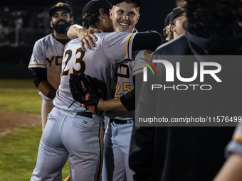 The Yolo High Wheelers celebrate advancing to the Pioneer Baseball League's championship series with their 6 to 4 win over the Oakland Balle...