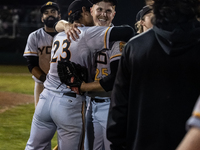 The Yolo High Wheelers celebrate advancing to the Pioneer Baseball League's championship series with their 6 to 4 win over the Oakland Balle...