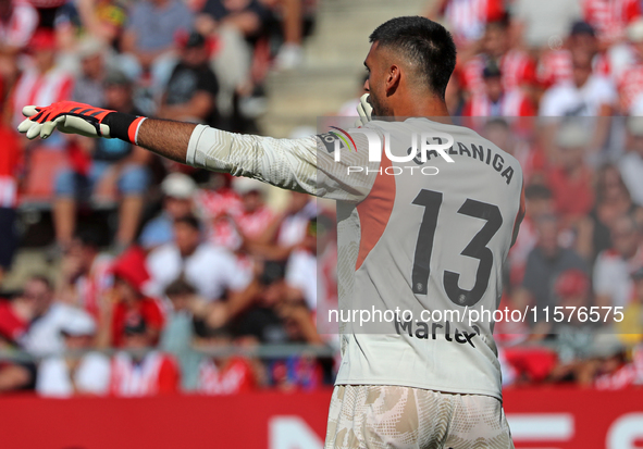 Paulo Gazzaniga plays during the match between Girona FC and FC Barcelona, corresponding to week 5 of LaLiga EA Sports, at the Montilivi Sta...