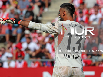 Paulo Gazzaniga plays during the match between Girona FC and FC Barcelona, corresponding to week 5 of LaLiga EA Sports, at the Montilivi Sta...