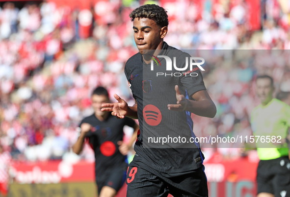 Lamine Yamal celebrates a goal during the match between Girona FC and FC Barcelona in the week 5 of LaLiga EA Sports, at the Montilivi Stadi...