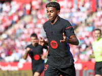 Lamine Yamal celebrates a goal during the match between Girona FC and FC Barcelona in the week 5 of LaLiga EA Sports, at the Montilivi Stadi...