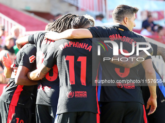 Lamine Yamal celebrates a goal during the match between Girona FC and FC Barcelona in the week 5 of LaLiga EA Sports, at the Montilivi Stadi...