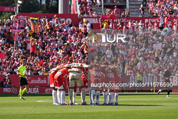 Girona fans cheer for their team during the La Liga EA SPORTS match against FC Barcelona at Estadi Montilivi, in Girona, Spain, on September...