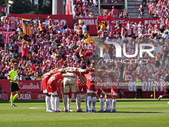 Girona fans cheer for their team during the La Liga EA SPORTS match against FC Barcelona at Estadi Montilivi, in Girona, Spain, on September...