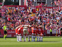 Girona fans cheer for their team during the La Liga EA SPORTS match against FC Barcelona at Estadi Montilivi, in Girona, Spain, on September...