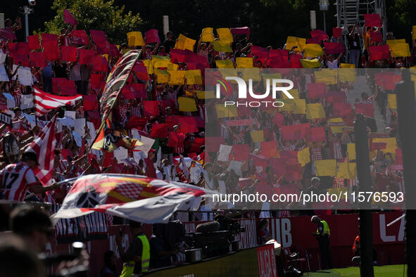 Girona fans cheer for their team during the La Liga EA SPORTS match against FC Barcelona at Estadi Montilivi, in Girona, Spain, on September...