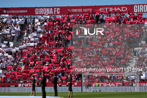 Girona fans cheer for their team during the La Liga EA SPORTS match against FC Barcelona at Estadi Montilivi, in Girona, Spain, on September...