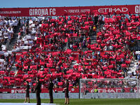 Girona fans cheer for their team during the La Liga EA SPORTS match against FC Barcelona at Estadi Montilivi, in Girona, Spain, on September...