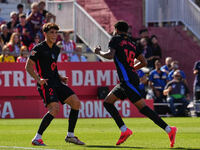 Lamine Yamal of FC Barcelona celebrates after scoring against Girona during the La Liga EA SPORTS match at Estadi Montilivi in Girona, Spain...