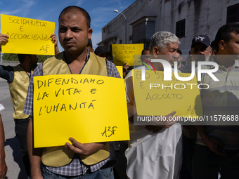 Immigrant communities in the Naples area stage a procession in Grumo Nevano, Italy, on Sunday against recent attacks on their members. ''Eno...