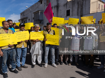 Immigrant communities in the Naples area stage a procession in Grumo Nevano, Italy, on Sunday against recent attacks on their members. ''Eno...