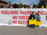 Immigrant communities in the Naples area stage a procession in Grumo Nevano, Italy, on Sunday against recent attacks on their members. ''Eno...