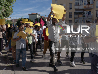 Immigrant communities in the Naples area stage a procession in Grumo Nevano, Italy, on Sunday against recent attacks on their members. ''Eno...