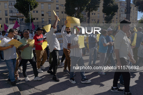 Immigrant communities in the Naples area stage a procession in Grumo Nevano, Italy, on Sunday against recent attacks on their members. ''Eno...