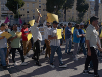 Immigrant communities in the Naples area stage a procession in Grumo Nevano, Italy, on Sunday against recent attacks on their members. ''Eno...