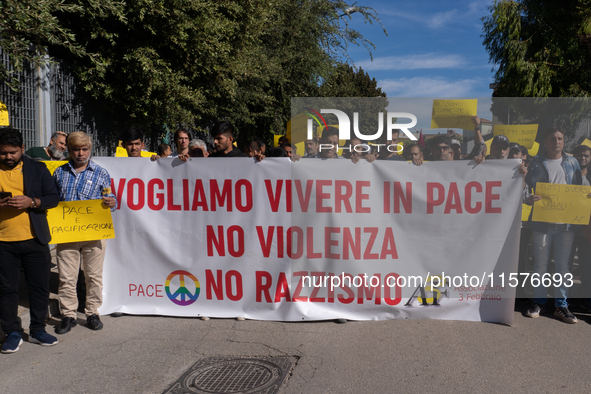 Immigrant communities in the Naples area stage a procession in Grumo Nevano, Italy, on Sunday against recent attacks on their members. ''Eno...