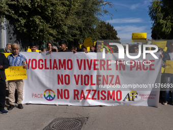 Immigrant communities in the Naples area stage a procession in Grumo Nevano, Italy, on Sunday against recent attacks on their members. ''Eno...