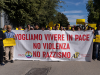 Immigrant communities in the Naples area stage a procession in Grumo Nevano, Italy, on Sunday against recent attacks on their members. ''Eno...