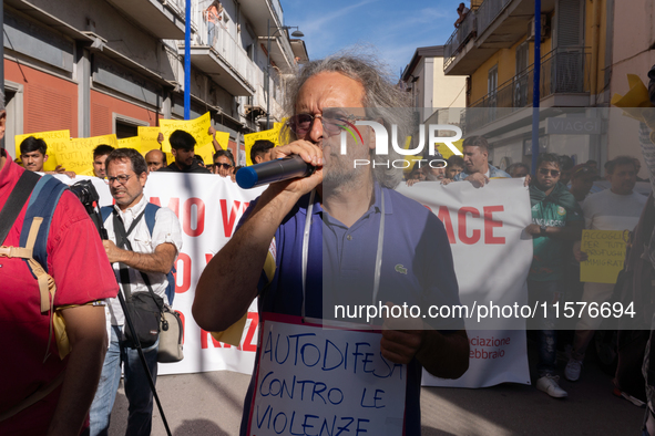 Immigrant communities in the Naples area stage a procession in Grumo Nevano, Italy, on Sunday against recent attacks on their members. ''Eno...