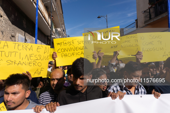 Immigrant communities in the Naples area stage a procession in Grumo Nevano, Italy, on Sunday against recent attacks on their members. ''Eno...