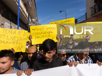 Immigrant communities in the Naples area stage a procession in Grumo Nevano, Italy, on Sunday against recent attacks on their members. ''Eno...