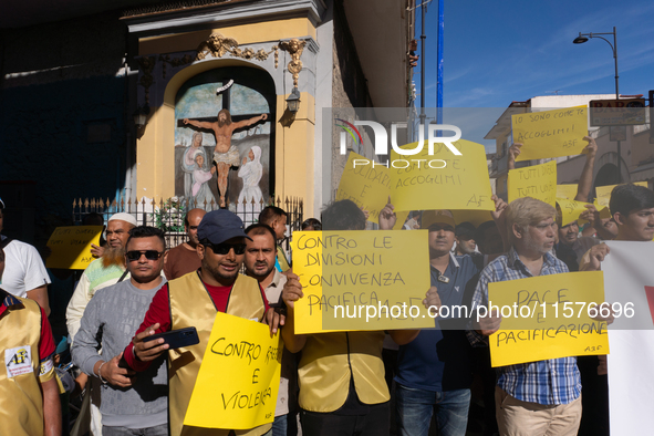 Immigrant communities in the Naples area stage a procession in Grumo Nevano, Italy, on Sunday against recent attacks on their members. ''Eno...