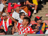 Girona fans cheer for their team during the La Liga EA SPORTS match against FC Barcelona at Estadi Montilivi, in Girona, Spain, on September...