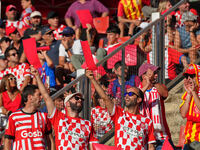 Girona fans cheer for their team during the La Liga EA SPORTS match against FC Barcelona at Estadi Montilivi, in Girona, Spain, on September...